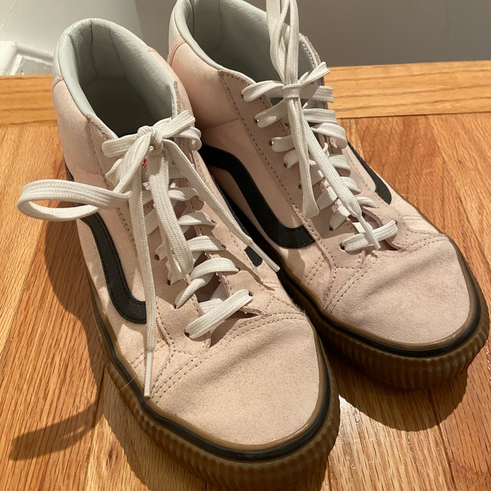 Pink “Femme Power” vans.